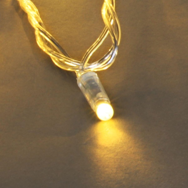 Уличная светодиодная гирлянда Sneha нить 230V теплый белый постоянный A-047C WW